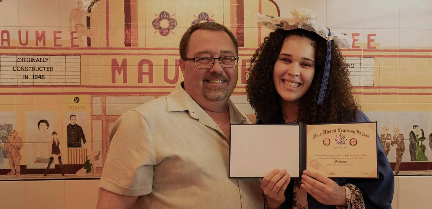 Student with diploma