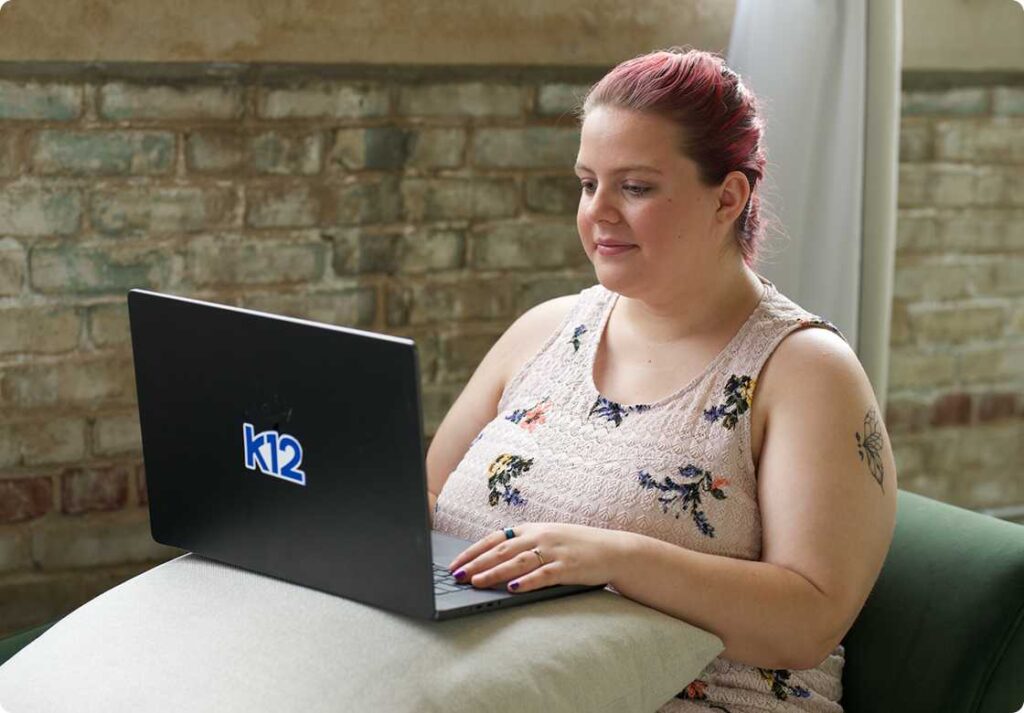 student working in her laptop