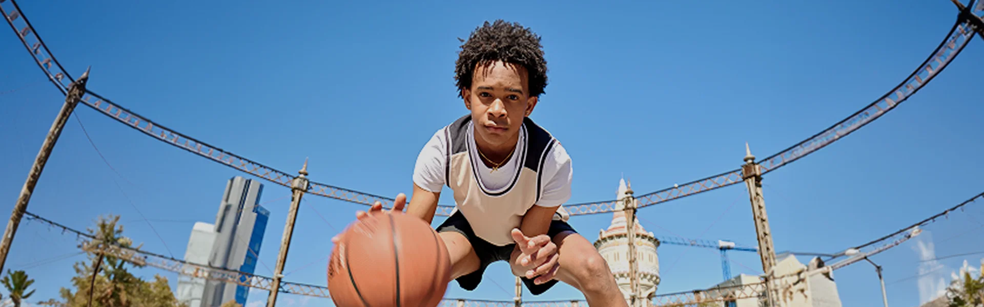 Student playing basketball